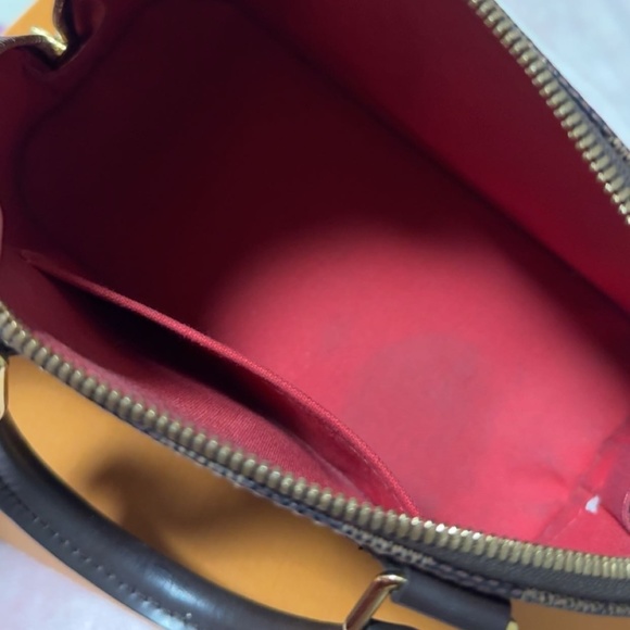 Loui Vuitton - Picture 1 of 3